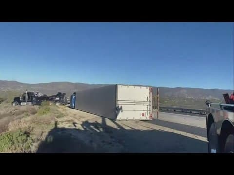 High winds across San Diego County knock over trees and semi-trucks