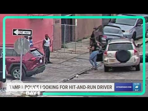 Tampa police search for woman seen on video hit man on scooter, drive away