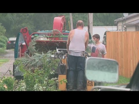 Kenton community members work together to clean up tornado damage