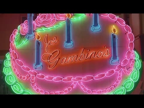 Gambino's iconic neon sign is back up