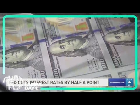 Fed cuts interest rates by half-point