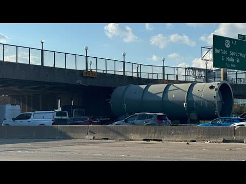 Live look at 610 Loop where truck's load struck pedestrian bridge