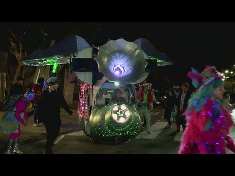 Crowd gathers in the French Quarter for Krewe Mosaique parade