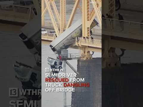 Semi driver rescued from truck dangling off Louisville bridge over Ohio River