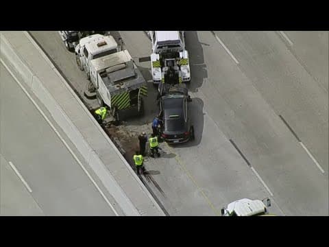 Crash into I-35E road crew truck shuts down lanes in Dallas, officials say