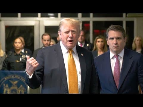 Donald Trump speaks to media in hallway of New York courthouse