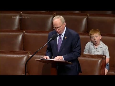 Congressman's son steals show on House floor, hamming it up for cameras