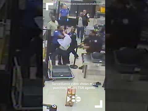 Surveillance video shows man punching Miami TSA agents