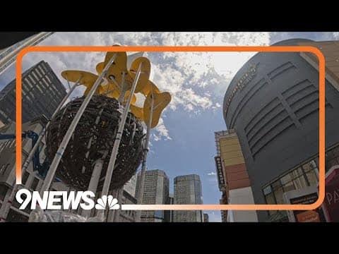 Climbable sculpture being installed on the 16th Street Mall