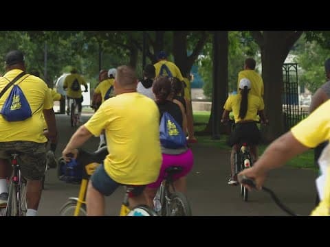 Bicyclists ride through White River State Park to support men's mental health