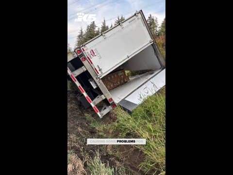 Truck carrying 40K pounds of bananas tips over, blocking SR 18
