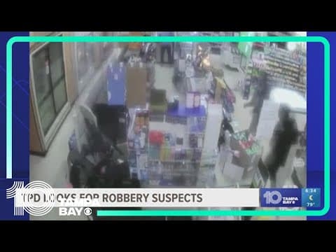 Tampa police search for suspects in 7-Eleven robbery caught on video