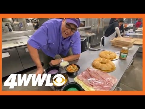Chef Kevin Belton checks out Rouses' King Cake Muffuletta
