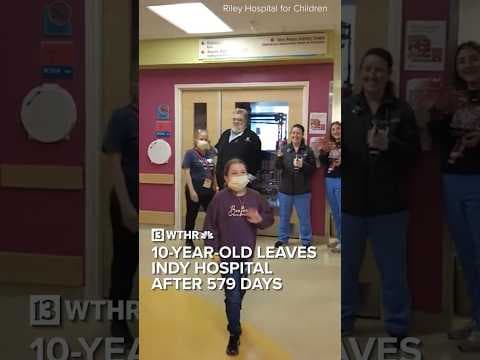 10-year-old walks out of Indy hospital after 579 days to clapping, cheers