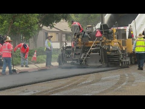Repair work is underway on Serra Mesa Road notorious for potholes