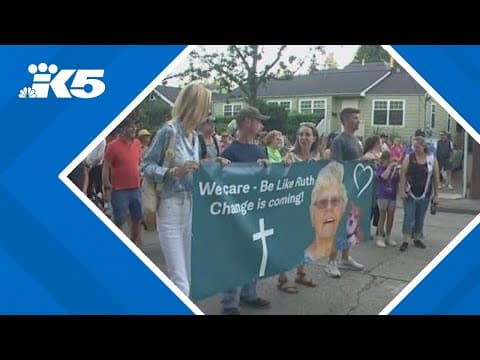 Hundreds of people and their dogs gather in Seattle to honor beloved dog walker killed in carjacking