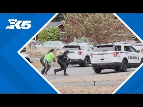 Man shot by police after tense standoff