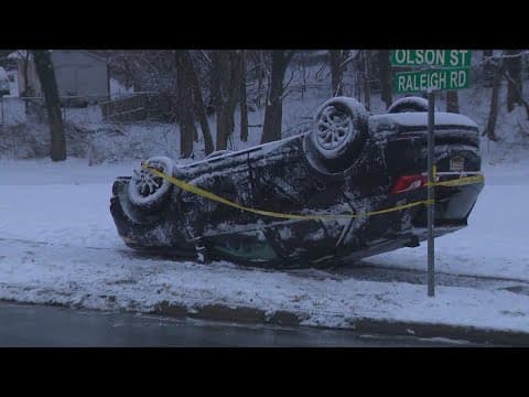 Car spins out and flips in Temple Hills during snow storm