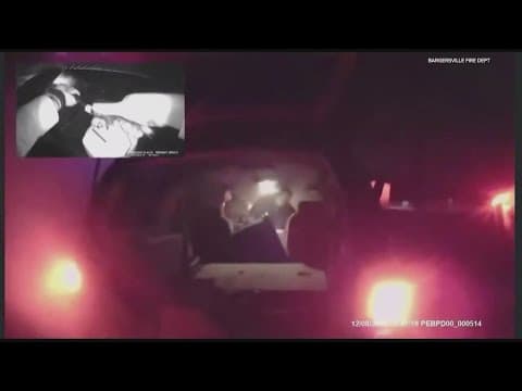 Bargersville police officers save a woman from burning car