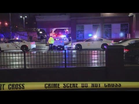 Man shot after hitting IMPD officer with car in CVS parking lot
