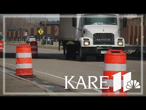 Why are road pavement markings more difficult to see in the rain & dark?