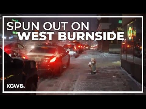 Snow causes drivers to spin out on West Burnside in Portland