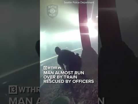 Man almost run over by train rescued by officers | Via:NBC