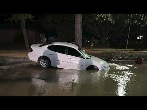 Video shows unsuspecting Houston drivers hit hole covered by water main break