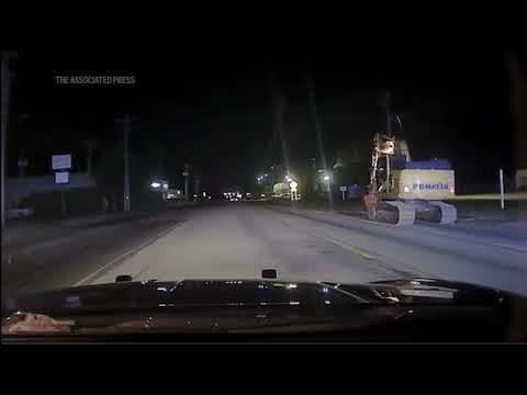 Not-so-hot pursuit sees police cars chase excavator at walking pace