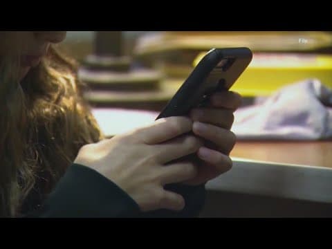 What districts are doing now that a new statewide law banning cellphones at school is in place