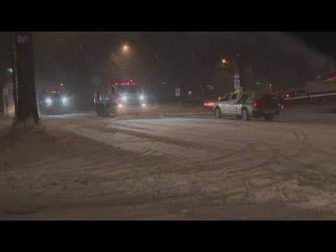 Snow plows working to clear roads in DC