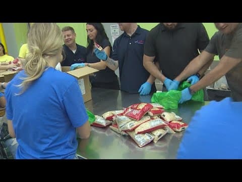 Volunteers from KHOU 11 and others helped package up food for Houston's needy this school year