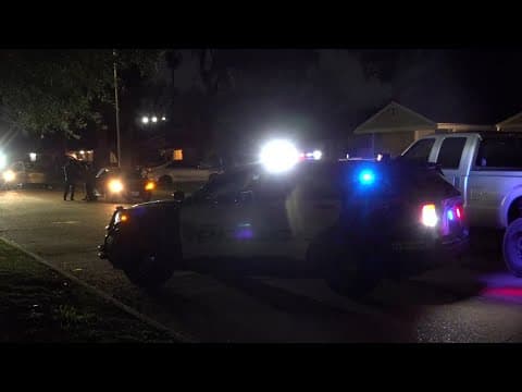 Man shot in foot, fights off robbers holding his family at gunpoint, police say; Neighbor also shot