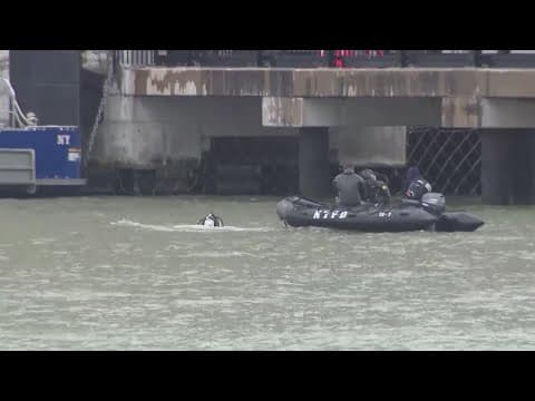 Divers search for parts of a NYC helicopter that crashed into the Hudson, killing 6