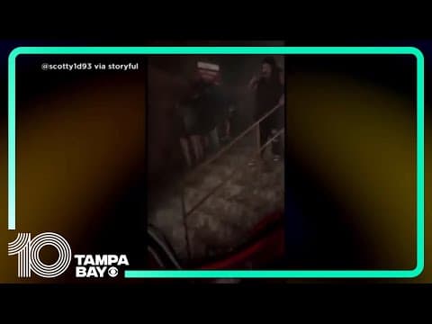 People run for cover as hail pelts a concert at Red Rocks in Colorado