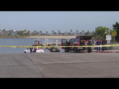 Woman's body found in submerged car