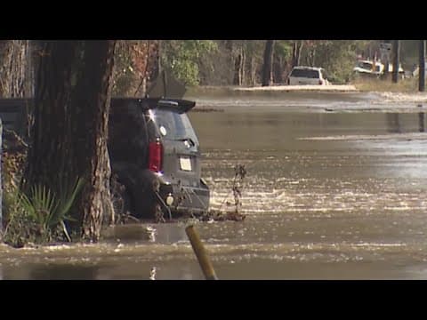 Cars stranded in high water along county roads in Southeast Texas