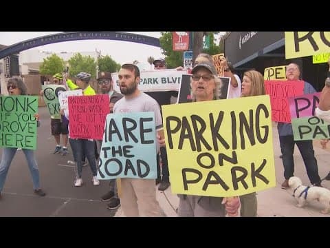 Residents and business owners protest new bike lanes along Park Boulevard