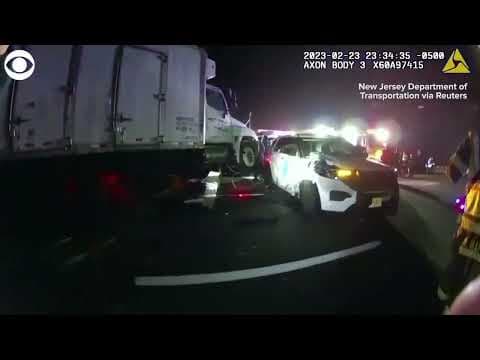 Dashcam footage captures moment tractor-trailer slams into police vehicles