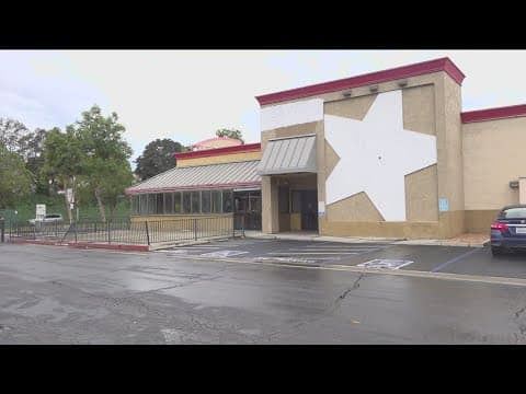 What's going on with the empty buildings at the shopping center in San Carlos?