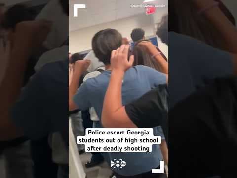 Police escort Georgia students out of high school after deadly shooting