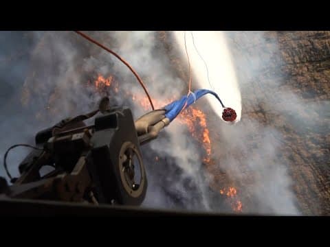 Hawaii wildfires: Army National Guard perform aerial water bucket drops on Maui