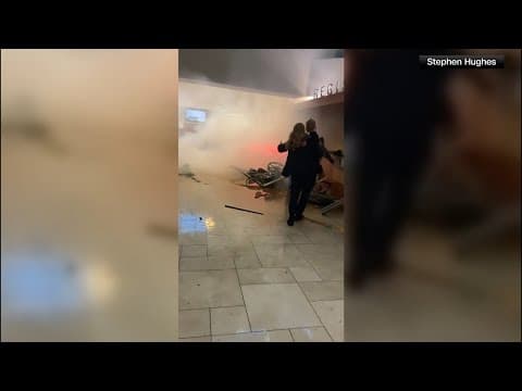 Video: People run to safety after car crashes into Austin emergency room