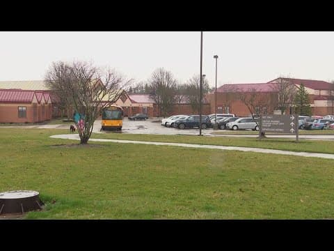 School cafeteria employee facing gun charge