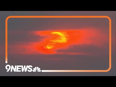 Wildfire smoke creates orange sunrise in Denver