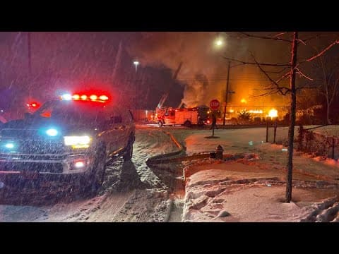 Crews battle east Indianapolis building fire
