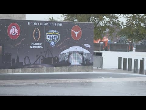 Crews clear icy roads around AT&T stadium ahead of Cotton Bowl Classic