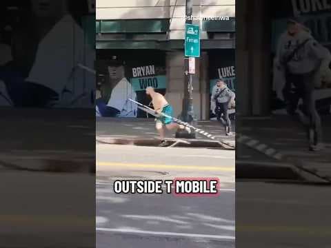 Video shows man stealing street preacher’s sign outside T-Mobile Park