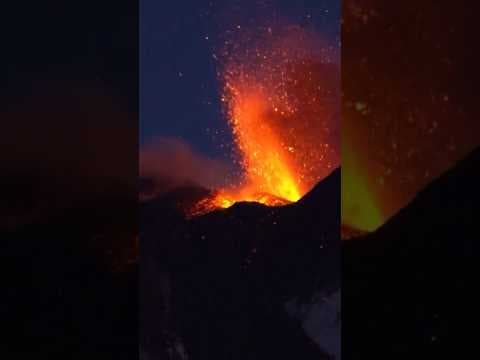 Mount Etna volcano erupts in Italy, sending hot lava down its snowy slope