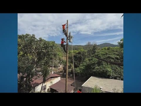 15 volunteer line workers return from doing work in Guatemala